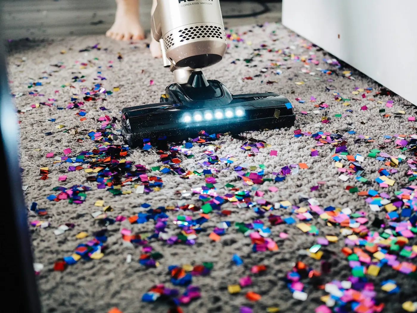 Vacuum cleaning a carpet